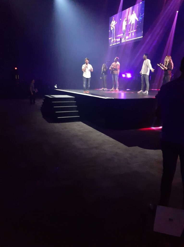 Chris Ulery speaking to a youth and young adult crowd