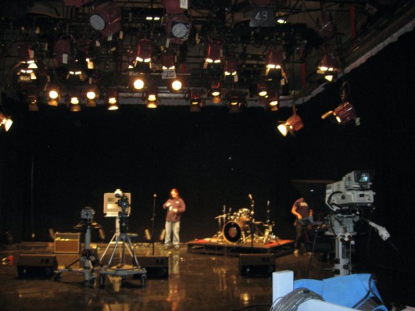 Chris Ulery performing on a television set