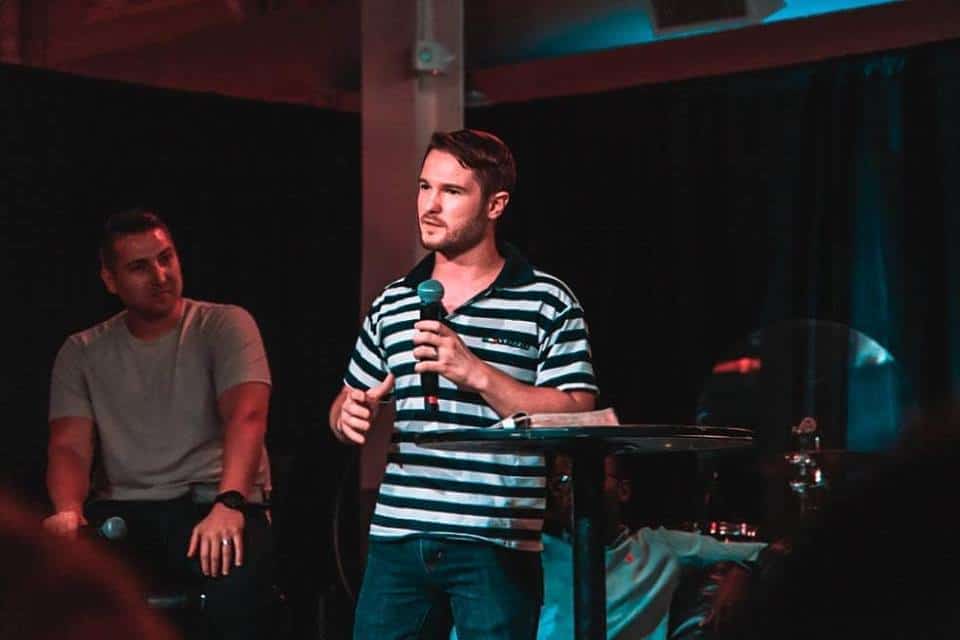 Chris Ulery speaking with Pastor Mark Kresge at Victory Downtown in Tulsa