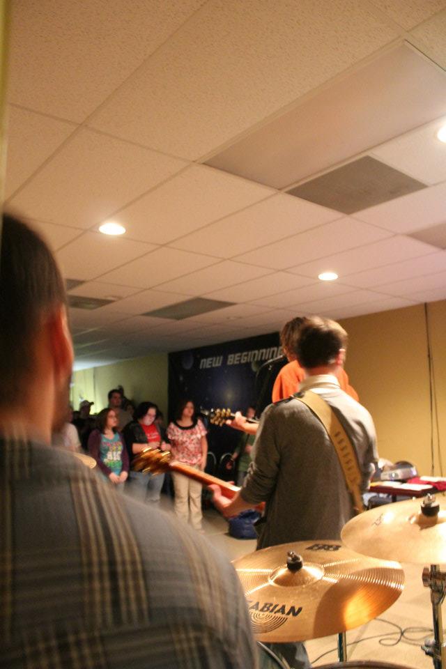 Musicians leading worship for a youth group at a Chris Ulery event