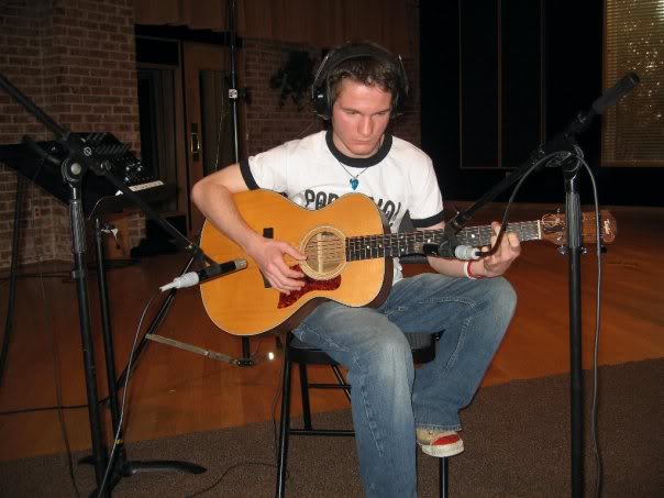 Chris Ulery recording acoustic guitar in the studio