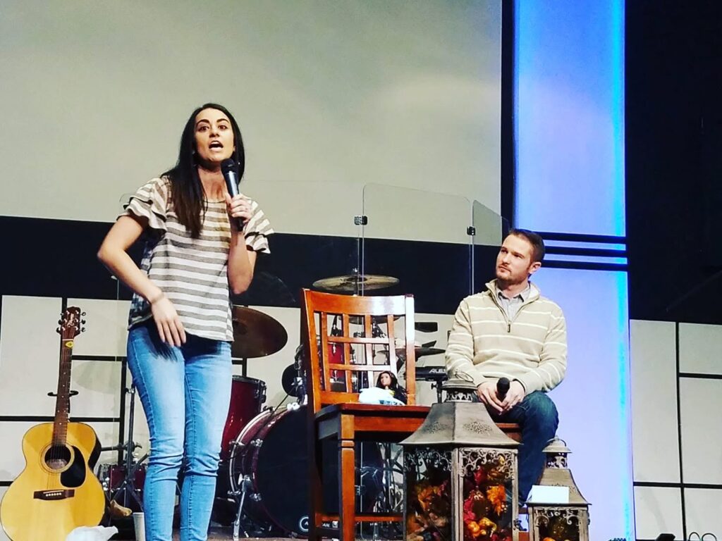 Jessica Ulery preaching alongside Chris Ulery at Freedom Church in Augusta, Kansas